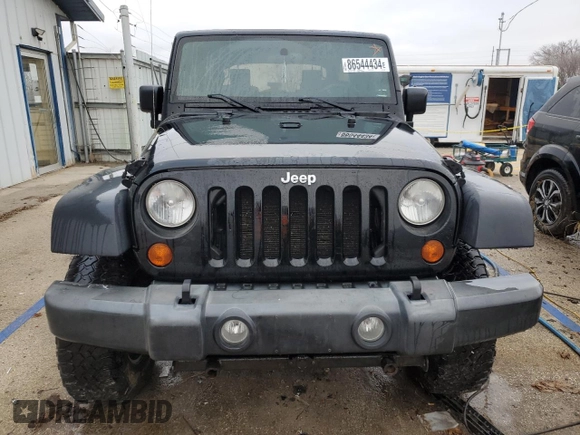 2007 Jeep Wrangler Unlimited Rubicon with VIN 1J8GA69147L113994, listed as a Copart auction lot 86544434 with 100,251 mi miles and Salvage title. Bid and sale history available at DreamBid. Image 5.