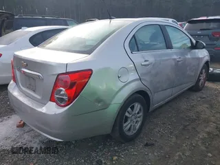 2013 Chevrolet Sonic LT with VIN 1G1JC5SH1D4205197, listed as a IAAI auction lot 41623803 with 153,666 mi miles and . Bid and sale history available at DreamBid. Image 4.
