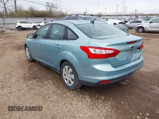 2012 Ford Focus SE with VIN 1FAHP3F24CL336350, listed as a IAAI auction lot 41882948 with 153,238 mi miles. Bid and sale history available at carsss.com. Image 3.