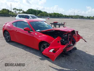 2015 Scion FR-S z VIN JF1ZNAA10F8712157, wystawiony jako IAAI lot #42186782 z przebiegiem 51 171 mil mil oraz . Historia ofert i sprzedaży dostępna na DreamBid. Obrazek 1.