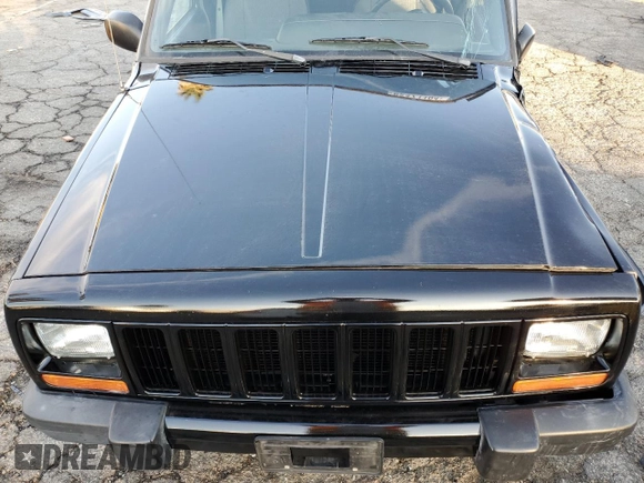 2001 Jeep Cherokee Sport with VIN 1J4FT48S51L568981, listed as a Copart auction lot 82471104 with 181,870 mi miles and Salvage Title. Bid and sale history available at carsss.com. Image 13.