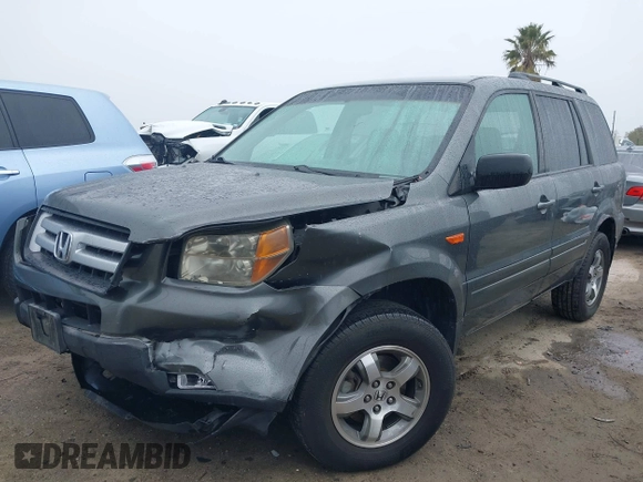 2007 Honda Pilot EX with VIN 2HKYF18497H500458, listed as a IAAI auction lot 41784273 with 114,454 mi miles. Bid and sale history available at carsss.com. Image 2.