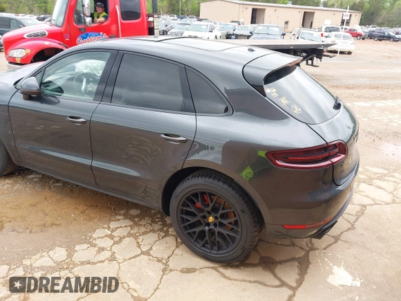 2017 Porsche Macan GTS with VIN WP1AG2A53HLB50635, listed as a IAAI auction lot 41665310 with 100,730 mi miles. Bid and sale history available at carsss.com. Image 3.