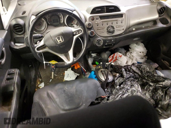 2010 Honda Fit Sport with VIN JHMGE8H42AC023154, listed as a Copart auction lot 42262615 with 104,928 mi miles and Salvage Title. Bid and sale history available at carsss.com. Image 8.