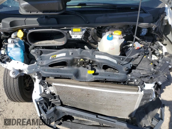 2023 Ram ProMaster Cargo with VIN 3C6LRVAG7PE583784, listed as a Copart auction lot 73926394 with 33,434 mi miles and Salvage Title. Bid and sale history available at DreamBid. Image 12.