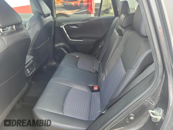 2023 Toyota RAV4 Hybrid XSE with VIN 2T35WRFVXPW176393, listed as a Copart auction lot 58304415 with 50,998 mi miles and Salvage title. Bid and sale history available at DreamBid. Image 11.