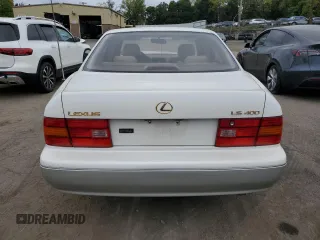 1996 Lexus LS 400 z VIN JT8BH22FXT0062989, wystawiony jako Copart lot #72543694 z przebiegiem 166 688 mil mil oraz Szkody całkowita. Historia ofert i sprzedaży dostępna na DreamBid. Obrazek 6.