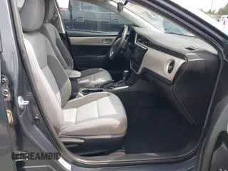 2018 Toyota Corolla L with VIN 5YFBURHE8JP770696, listed as a IAAI auction lot 42386025 with 63,224 mi miles and . Bid and sale history available at DreamBid. Image 5.