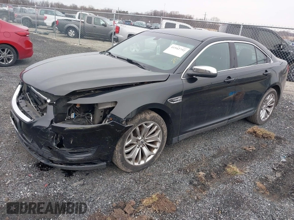 2014 Ford Taurus Limited with VIN 1FAHP2F81EG113984, listed as a IAAI auction lot 41542792 with 213,206 mi miles. Bid and sale history available at carsss.com. Image 2.