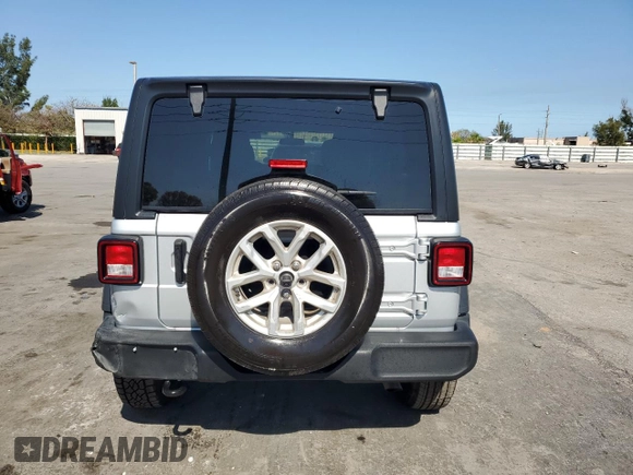 2023 Jeep Wrangler Willys with VIN 1C4HJXDNXPW702199, listed as a Copart auction lot 53815985 with 24,943 mi miles and Clean Title. Bid and sale history available at DreamBid. Image 6.