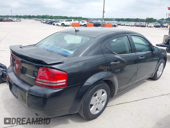 2009 Dodge Avenger SE with VIN 1B3LC46B89N502258, listed as a IAAI auction lot 42132545 with 142,305 mi miles and . Bid and sale history available at carsss.com. Image 4.