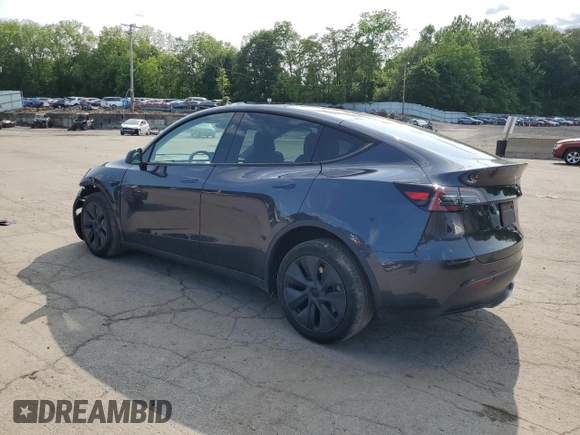 2024 Tesla Model Y Long Range z VIN 7SAYGDEE9RF186388, wystawiony jako Copart lot #58471595 z przebiegiem 23 185 mil mil oraz Szkoda całkowita • Salvage title. Historia ofert i sprzedaży dostępna na DreamBid. Obrazek 2.