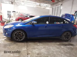 2014 Ford Focus SE with VIN 1FADP3F21EL194900, listed as a IAAI auction lot 41341333 with 103,245 mi miles. Bid and sale history available at carsss.com. Image 14.
