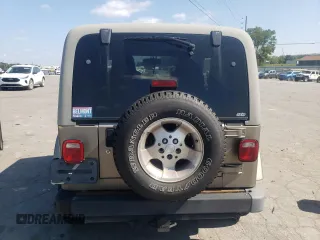 2003 Jeep Wrangler Sahara with VIN 1J4FA59S23P303845, listed as a Copart auction lot 68101244 with 141,753 mi miles and Clean Title. Bid and sale history available at carsss.com. Image 6.