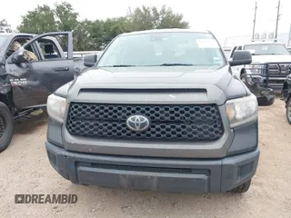 2019 Toyota Tundra SR with VIN 5TFRM5F1XKX143105, listed as a IAAI auction lot 41274567 with 180,602 mi miles and . Bid and sale history available at DreamBid. Image 13.