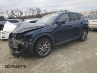 2020 Mazda CX-5 Grand Touring with VIN JM3KFADM4L1783968, listed as a Copart auction lot 85994244 with 89,074 mi miles and Salvage Title. Bid and sale history available at carsss.com. Image 1.