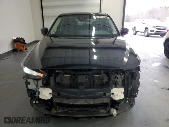 2021 Mazda CX-5 Touring with VIN JM3KFBCMXM0338844, listed as a Copart auction lot 53201615 with 137,498 mi miles and Clean Title. Bid and sale history available at carsss.com. Image 5.