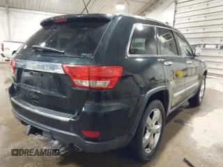 2013 Jeep Grand Cherokee Overland with VIN 1C4RJECT4DC526465, listed as a IAAI auction lot 41570663 with 116,948 mi miles. Bid and sale history available at carsss.com. Image 4.