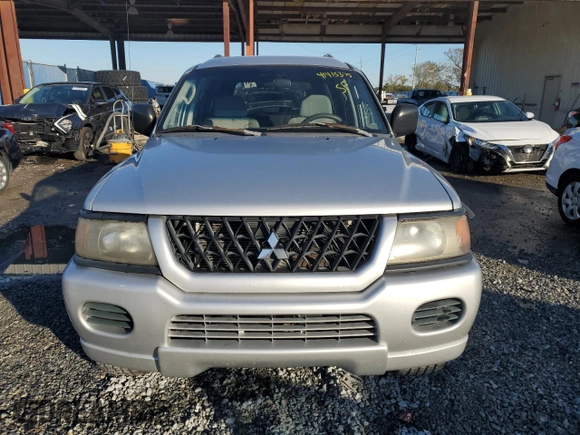 2003 Mitsubishi Montero ES z VIN JA4LS21H13J005577, wystawiony jako Copart lot #41415375 z przebiegiem 171 037 mil mil oraz Szkoda całkowita • Salvage title. Historia ofert i sprzedaży dostępna na DreamBid. Obrazek 5.