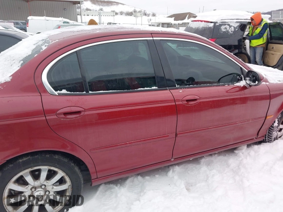 2003 Jaguar X-Type 2.5L Manual z VIN SAJEA51D63XC89273, wystawiony jako IAAI lot #41298544 z przebiegiem 124 400 mil mil oraz . Historia ofert i sprzedaży dostępna na DreamBid. Obrazek 13.