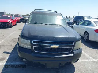2011 Chevrolet Suburban LT with VIN 1GNSCJE0XBR285973, listed as a IAAI auction lot 42007844 with 252,994 mi miles. Bid and sale history available at carsss.com. Image 12.