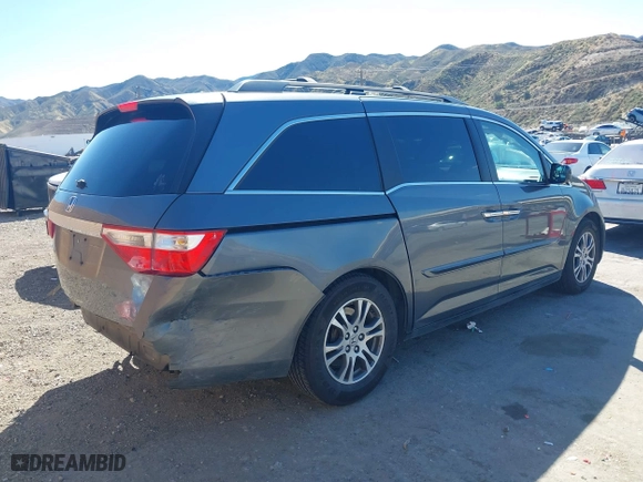 2011 Honda Odyssey EX-L with VIN 5FNRL5H68BB092628, listed as a IAAI auction lot 41820351 with 243,538 mi miles. Bid and sale history available at carsss.com. Image 4.