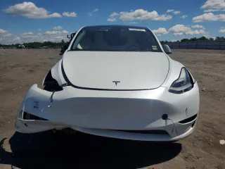 2022 Tesla Model Y Performance with VIN 7SAYGDEF9NF372337, listed as a Copart auction lot 55889345 with 51,099 mi miles and Salvage title. Bid and sale history available at DreamBid. Image 5.