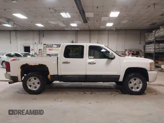 2007 Chevrolet Silverado 1500 LT w/2LT with VIN 2GCEK13MX71677513, listed as a IAAI auction lot 42023608 with 144,555 mi miles. Bid and sale history available at carsss.com. Image 13.