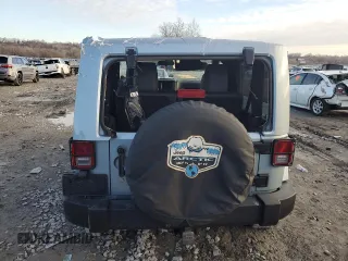 2012 Jeep Wrangler Arctic with VIN 1C4AJWBG9CL167538, listed as a Copart auction lot 41466665 with 257,612 mi miles and Salvage title. Bid and sale history available at DreamBid. Image 6.
