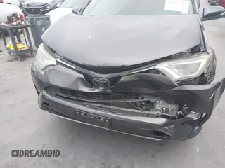 2018 Toyota RAV4 XLE with VIN 2T3WFREV1JW512476, listed as a IAAI auction lot 42177733 with 132,207 mi miles and . Bid and sale history available at DreamBid. Image 6.