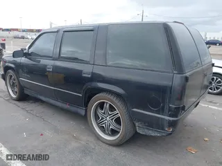 2000 Chevrolet Tahoe Limited with VIN 1GNEC13R7YR151624, listed as a IAAI auction lot 41785878 with 227,576 mi miles. Bid and sale history available at carsss.com. Image 3.