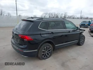 2020 Volkswagen Tiguan SE with VIN 3VV3B7AX7LM067046, listed as a IAAI auction lot 41697405 with 53,573 mi miles and . Bid and sale history available at DreamBid. Image 4.