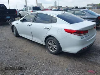 2018 Kia Optima LX with VIN 5XXGT4L36JG210914, listed as a IAAI auction lot 42545614 with 126,286 mi miles and . Bid and sale history available at DreamBid. Image 3.