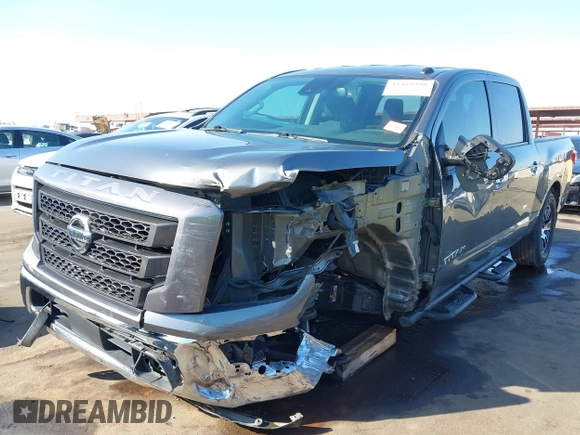 2021 Nissan Titan SV with VIN 1N6AA1EF2MN504611, listed as a IAAI auction lot 41469990 with 81,432 mi miles and . Bid and sale history available at DreamBid. Image 6.