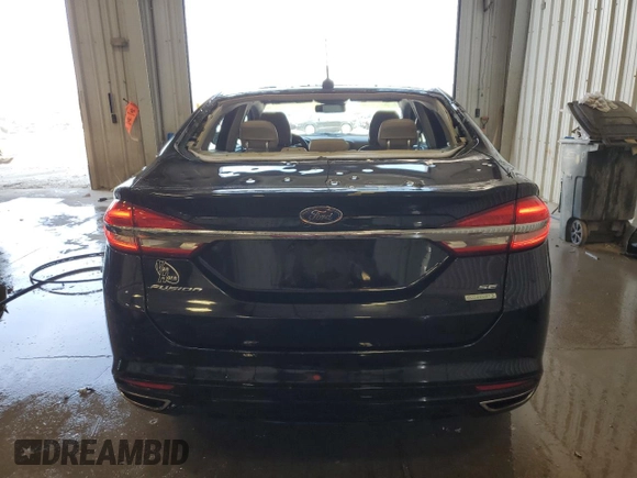 2017 Ford Fusion SE z VIN 3FA6P0H9XHR119202, wystawiony jako Copart lot #55774645 z przebiegiem 93 525 mil mil oraz Nie do naprawy • Non repairable. Historia ofert i sprzedaży dostępna na DreamBid. Obrazek 6.