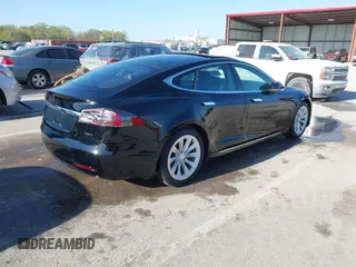 2017 Tesla Model S 100D with VIN 5YJSA1E27HF230508, listed as a IAAI auction lot 42040511 with 98,693 mi miles. Bid and sale history available at carsss.com. Image 4.
