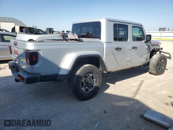 2023 Jeep Gladiator Mojave with VIN 1C6JJTEGXPL547222, listed as a Copart auction lot 52143545 with 28,586 mi miles and Salvage title. Bid and sale history available at DreamBid. Image 3.