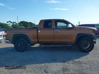 2016 Toyota Tundra SR z VIN 5TFRM5F19GX102715, wystawiony jako IAAI lot #41265300 z przebiegiem 109 619 mil mil oraz . Historia ofert i sprzedaży dostępna na DreamBid. Obrazek 14.