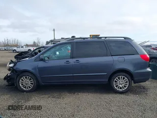 2008 Toyota Sienna XLE with VIN 5TDBK22C98S017300, listed as a IAAI auction lot 41433777 with 248,602 mi miles. Bid and sale history available at carsss.com. Image 14.