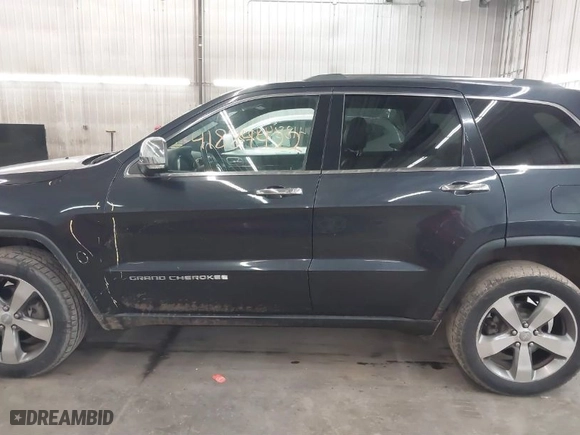 2015 Jeep Grand Cherokee Limited with VIN 1C4RJFBG8FC665320, listed as a IAAI auction lot 41884422 with 125,610 mi miles. Bid and sale history available at carsss.com. Image 14.
