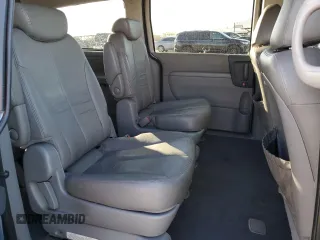 2009 Kia Sedona EX with VIN KNDMB233196275030, listed as a Copart auction lot 71997154 with 96,777 mi miles and Salvage Title. Bid and sale history available at carsss.com. Image 12.