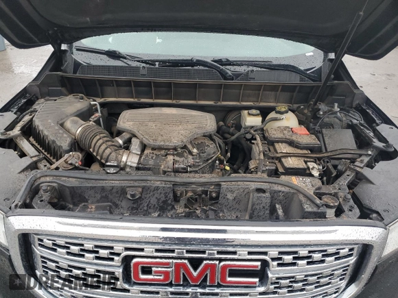 2018 GMC Acadia Denali z VIN 1GKKNPLS4JZ147200, wystawiony jako Copart lot #51615025 z przebiegiem 107 246 mil mil oraz Szkoda całkowita • Salvage title. Historia ofert i sprzedaży dostępna na DreamBid. Obrazek 13.