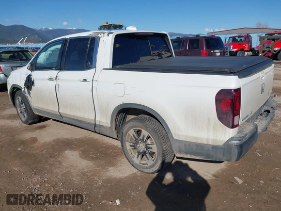 2020 Honda Ridgeline RTL with VIN 5FPYK3F50LB028430, listed as a IAAI auction lot 42033090 with Not provided miles and . Bid and sale history available at DreamBid. Image 3.