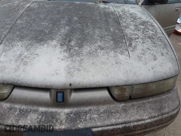1996 Oldsmobile Cutlass Supreme S z VIN 1G3WH52M9TF377685, wystawiony jako IAAI lot #41496775 z przebiegiem 197 366 mil mil oraz . Historia ofert i sprzedaży dostępna na DreamBid. Obrazek 10.