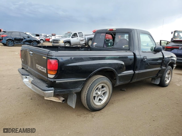 2000 Mazda B-Series 2WD Truck SX with VIN 4F4YR12C0YTM03810, listed as a Copart auction lot 70212584 with 169,361 mi miles and Salvage Title. Bid and sale history available at carsss.com. Image 3.