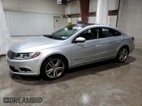 2014 Volkswagen CC VR6 Executive 4Motion with VIN WVWGU7AN5EE525409, listed as a Copart auction lot 83964324 with 118,465 mi miles and Salvage Title. Bid and sale history available at carsss.com. Image 1.