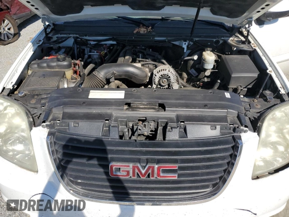 2007 GMC Yukon SLE with VIN 1GKFK13017J109923, listed as a Copart auction lot 77085954 with 214,986 mi miles and Salvage Title. Bid and sale history available at carsss.com. Image 13.