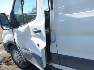 2023 Ford Transit Cargo with VIN 1FTBR2X84PKB37947, listed as a IAAI auction lot 41750849 with 58,114 mi miles and . Bid and sale history available at DreamBid. Image 14.