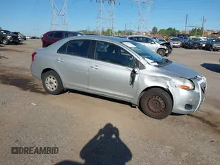 2009 Toyota Yaris with VIN JTDBT903891307874, listed as a IAAI auction lot 42150366 with 218,350 mi miles. Bid and sale history available at carsss.com. Image 1.