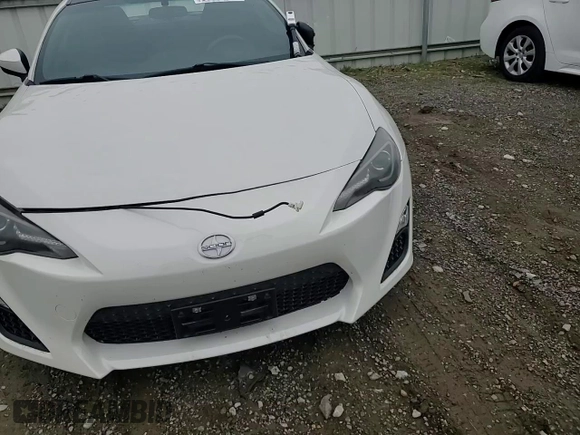 2015 Scion FR-S z VIN JF1ZNAA14F8703283, wystawiony jako Copart lot #50995885 z przebiegiem 101 033 mil mil oraz Szkoda całkowita • Salvage title. Historia ofert i sprzedaży dostępna na DreamBid. Obrazek 11.